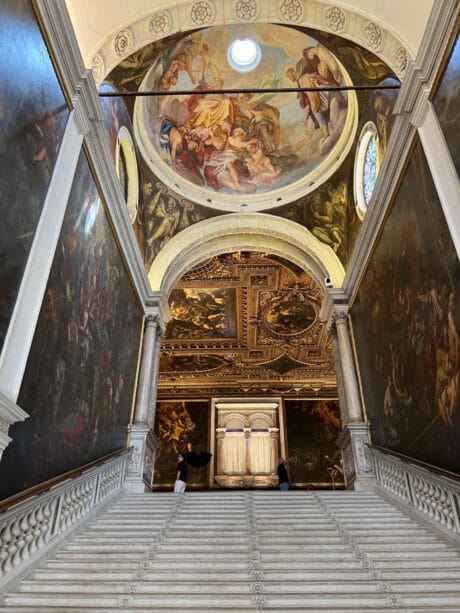 Staircase in the Scuola Grande di San Rocco, with its extraordinary cycle of more than 60 paintings by Jacopo Tintoretto, is one of the greatest art treasures in Venice.